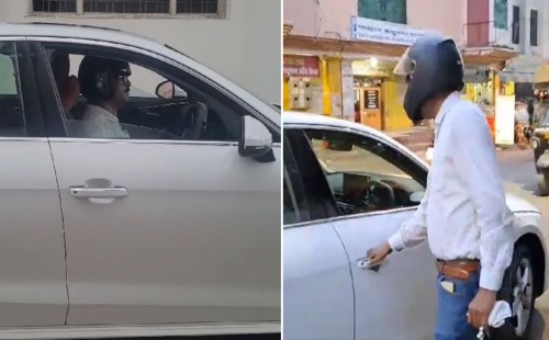 জরিমানার ভয়ে হেলমেট পরে গাড়ি চালান বাহাদুর! 